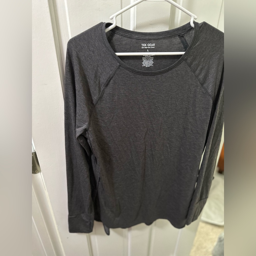 Long grey Tek Gear top, split sides on the bottom